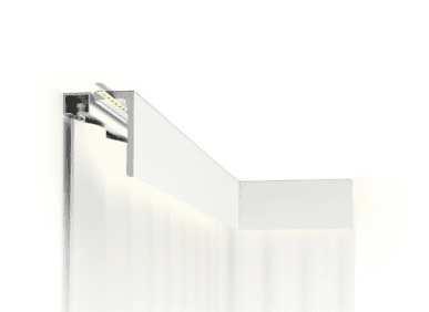 UK Home Interiors decorative fluted cornice in a room setting, showcasing traditional interior mould.