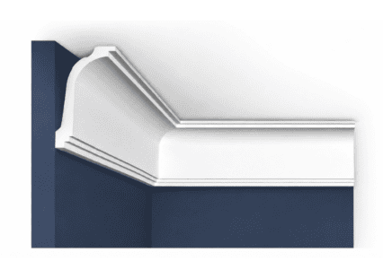 Coving with elegant white decorative moulding against a navy blue wall.