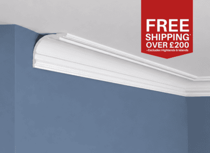 Decorative ceiling cornice with detailed moulding for interior design.