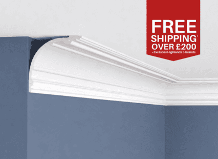 Decorative white cornice moulding for interior ceiling and wall detailing.