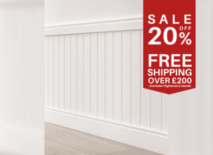 Decorative wall paneling with vertical MDF tongue and groove planks in a room setting.