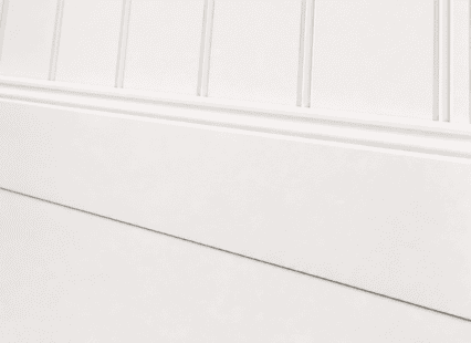 Decorative dado wall paneling in a traditional interior setting, made of MDF with tongue and groove.