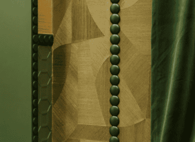 Decorative interior wall moulding with geometric patterns and bead detail in a UK home interior.